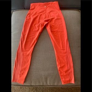 Invigorate Coral color lululemon leggings 25in inseam